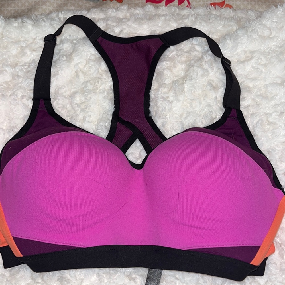 Victoria’s Secret Sport bra. Color: Black/Pink/Orange. Size: 34C.